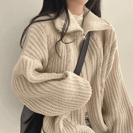 Gilet en maille torsadée à zip double sens